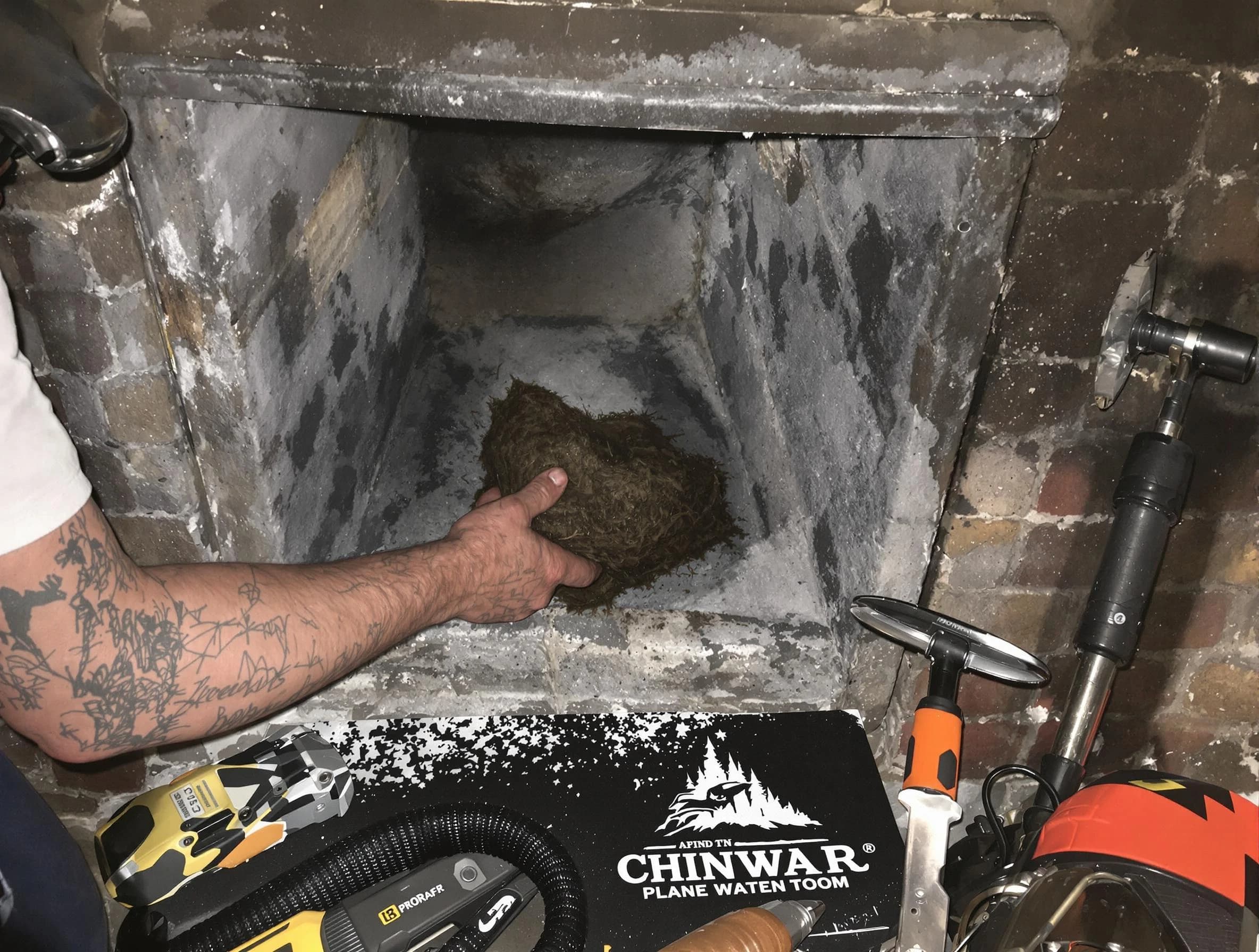 Mountain Green Chimney Sweep safely removing debris and screening chimney in Mountain Green, UT